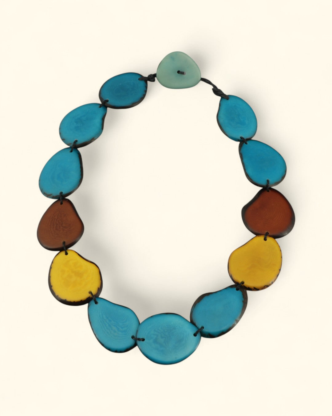 Eco-conscious statement necklace in blue, yellow, and brown