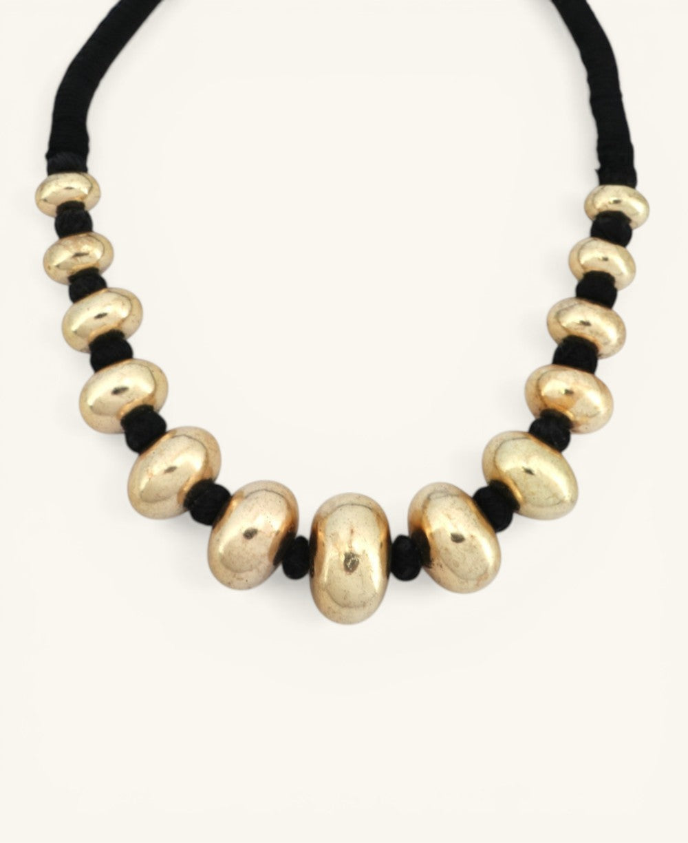 hampagne gold chunky bead choker necklace on black cord