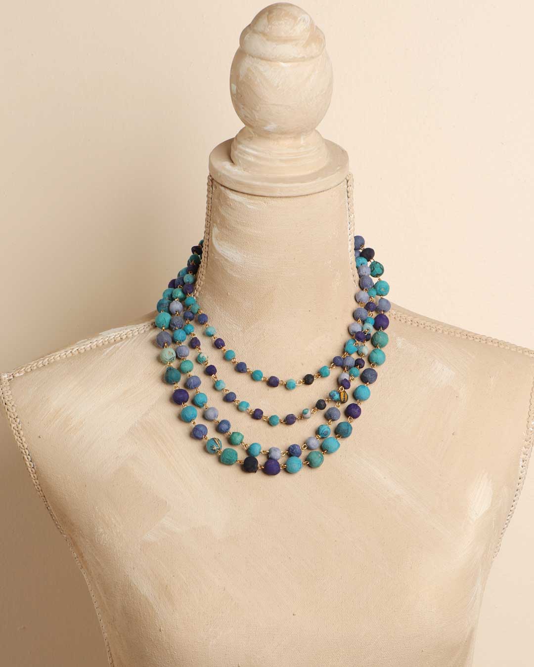 Handmade necklace with layered recycled textile beads