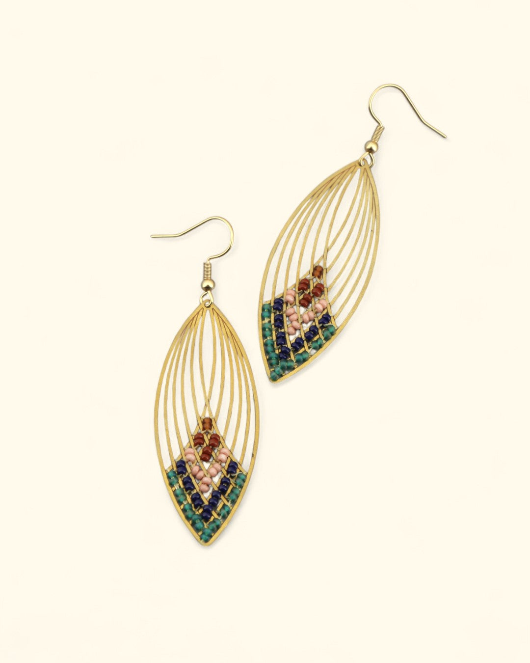 Handcrafted swooping oval earrings with brass and beads