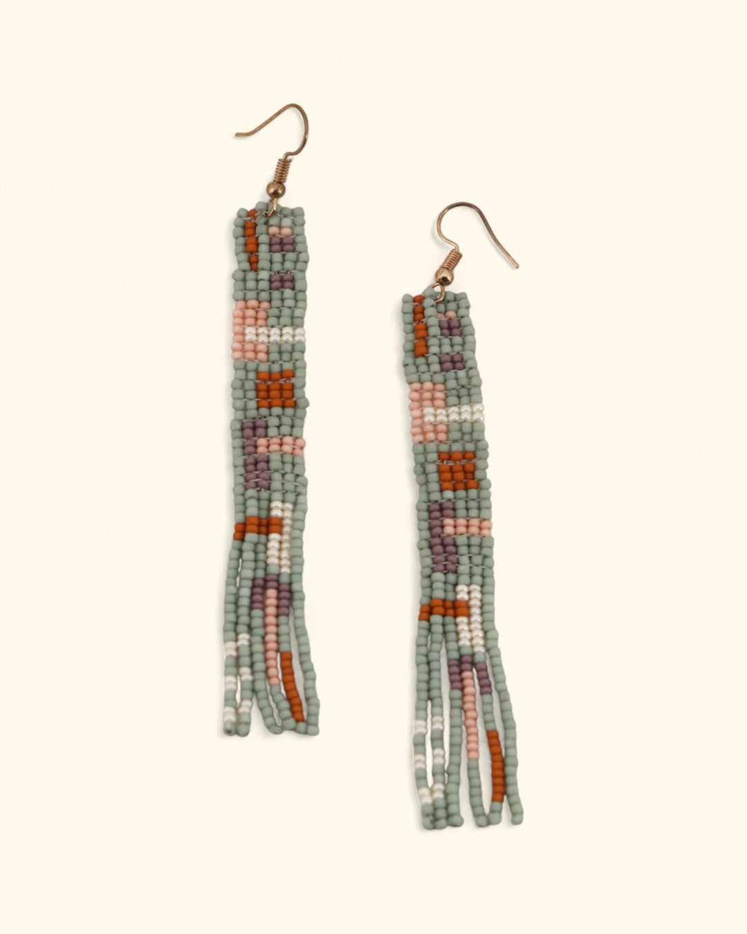 Earth-toned beaded fringe earrings in sage, mauve, and ivory