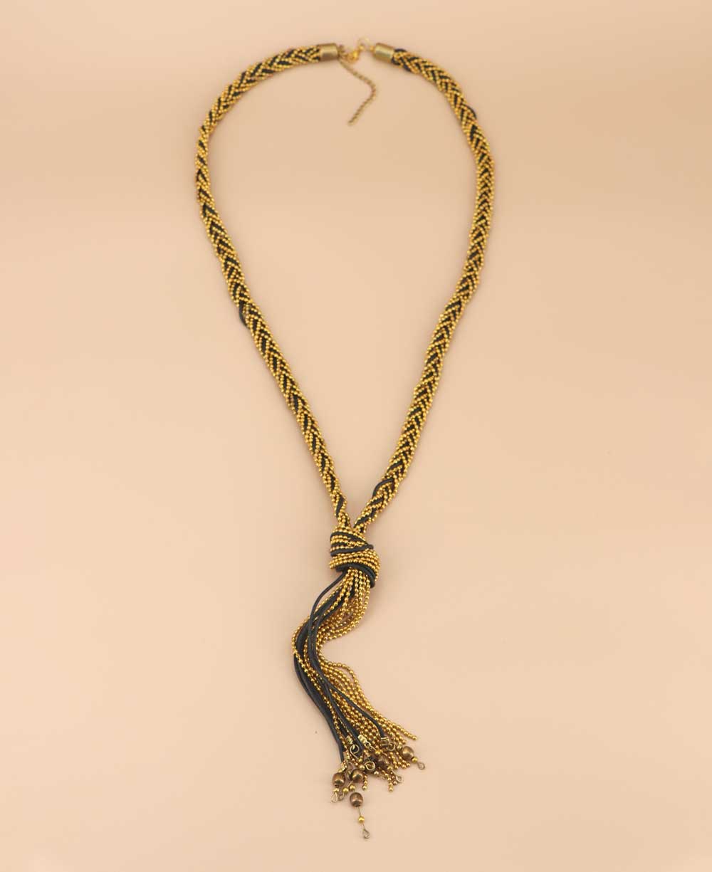 Artisanal blue necklace with metal beads and threads