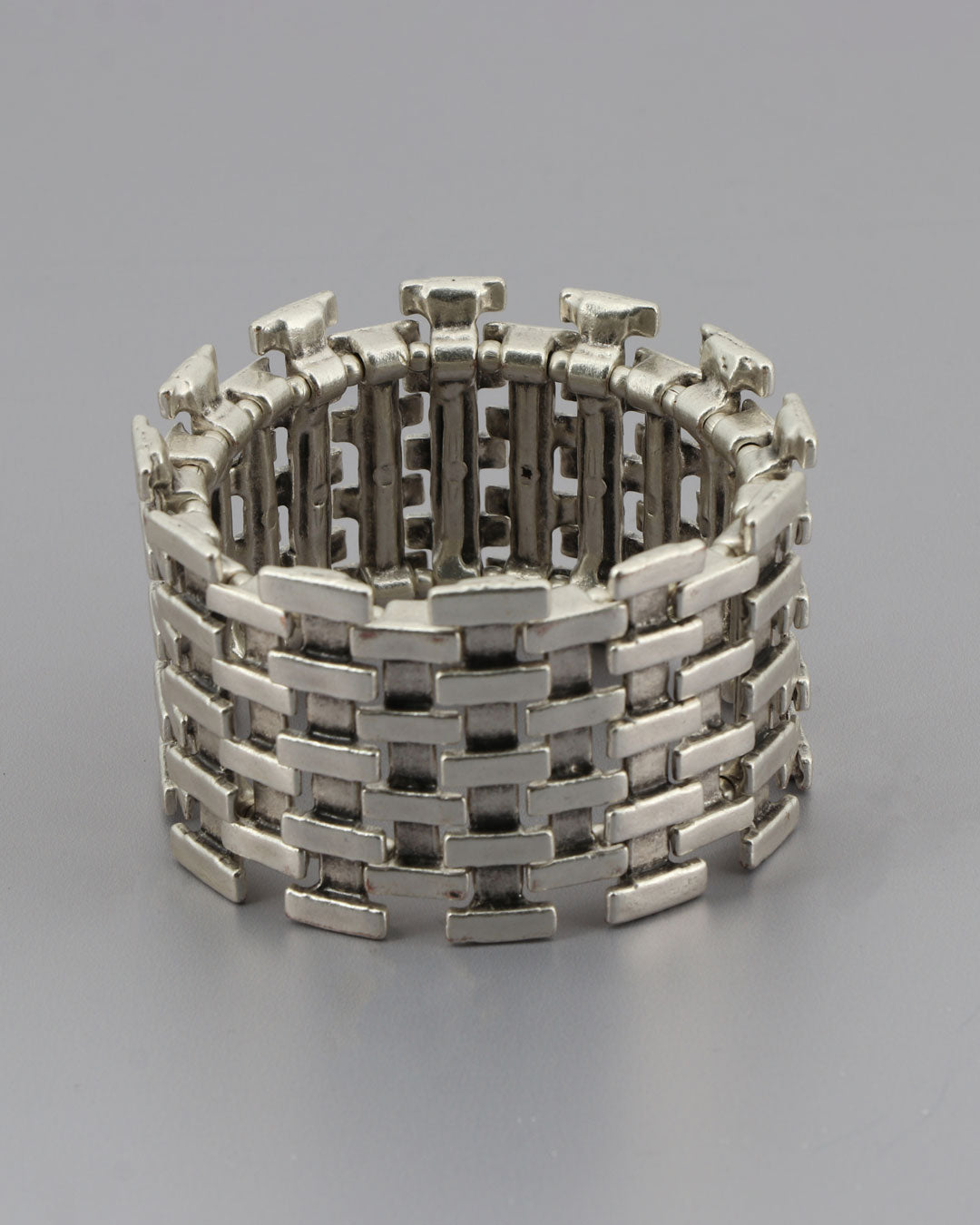 Sculptural silver-tone metal cuff bracelet with stretch design