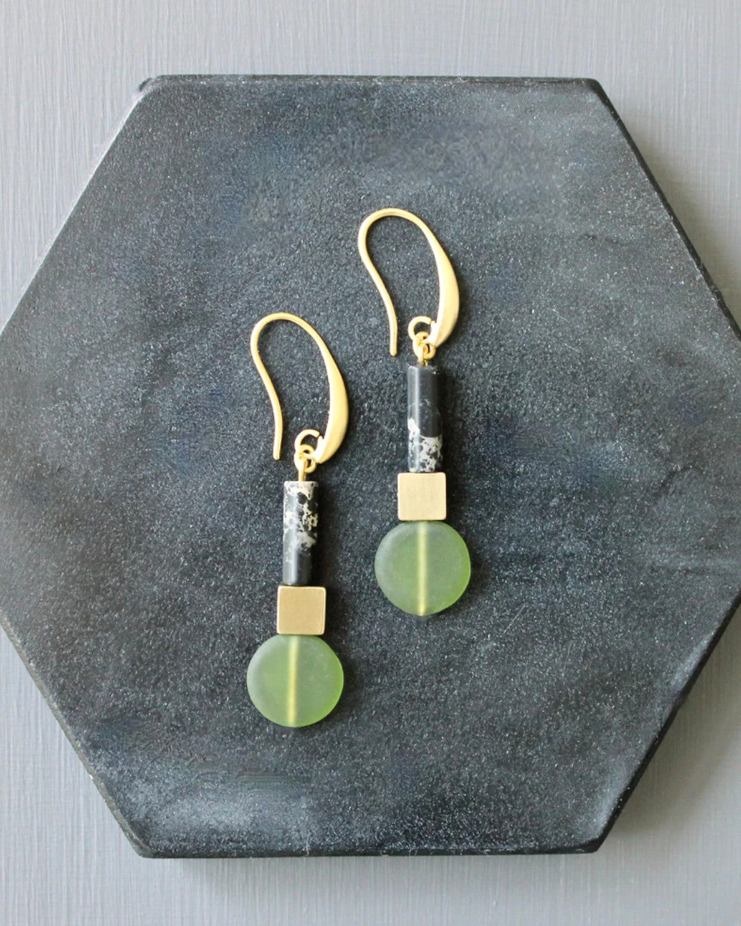 Geometric drop earrings in green and black with gold hooks