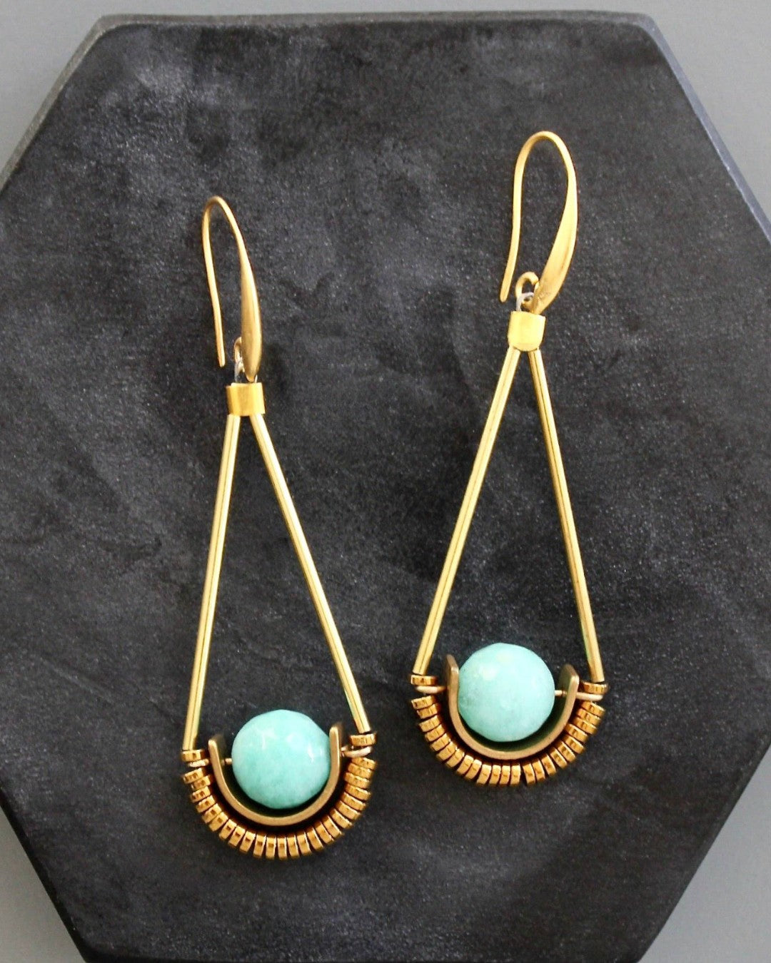 Geometric statement earrings with gold arcs and natural stones