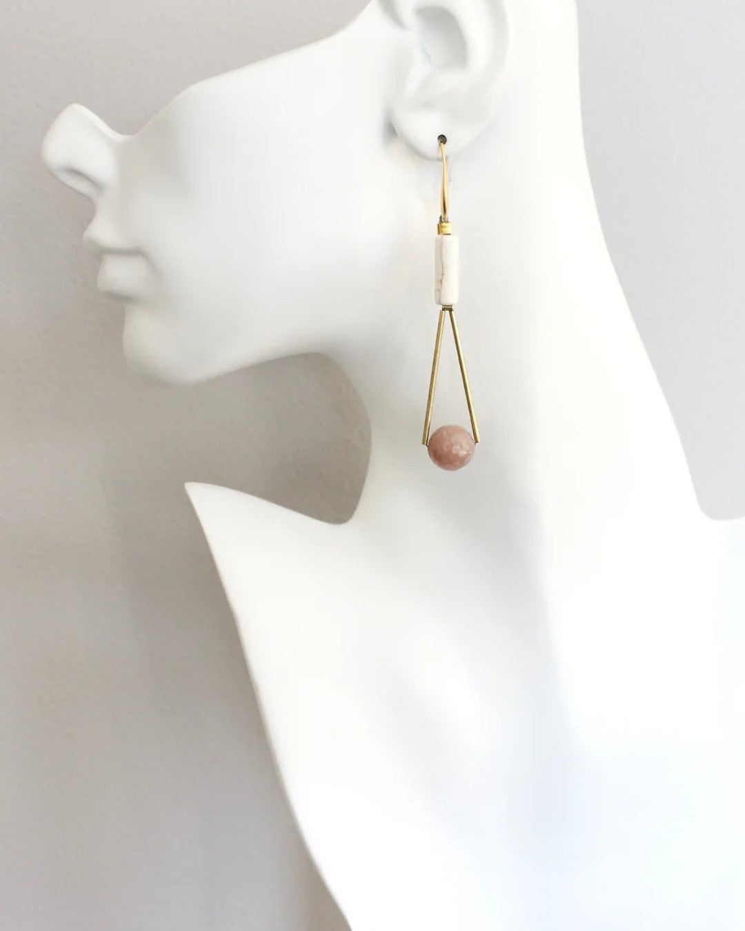 Modern geometric earrings in brass with faceted moonstone
