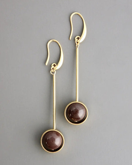 Long drop earrings with brown agate stones