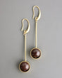 Long drop earrings with brown agate stones