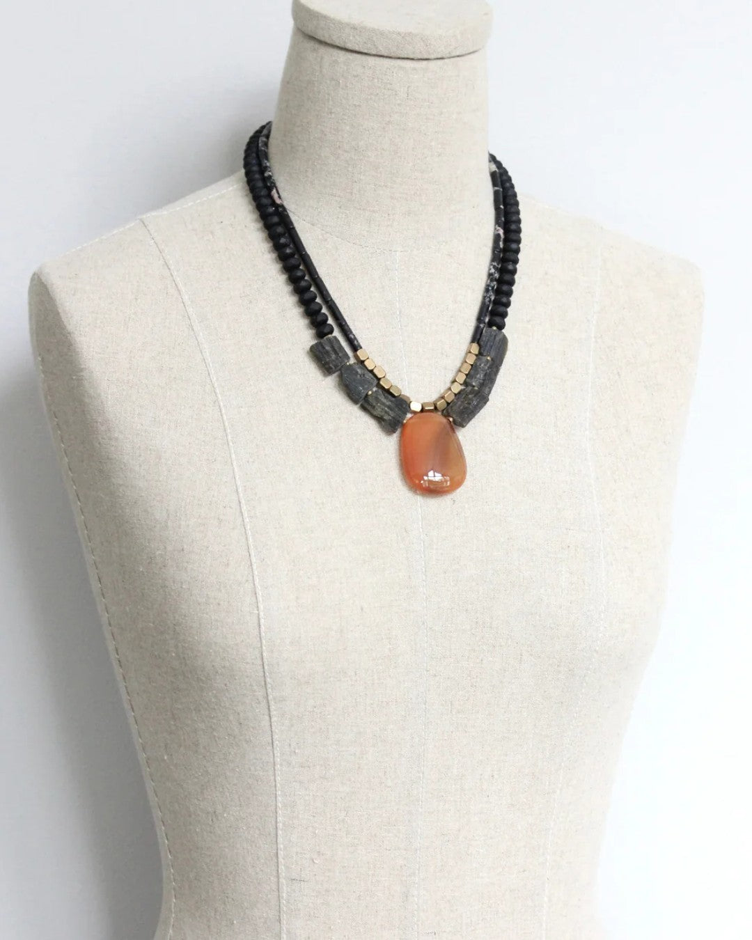 USA-made necklace with faceted glass and brass details