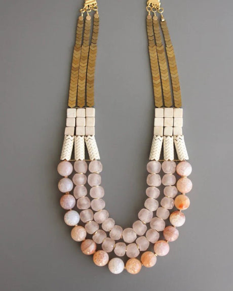 Triple strand fire agate necklace with magnesite and brass