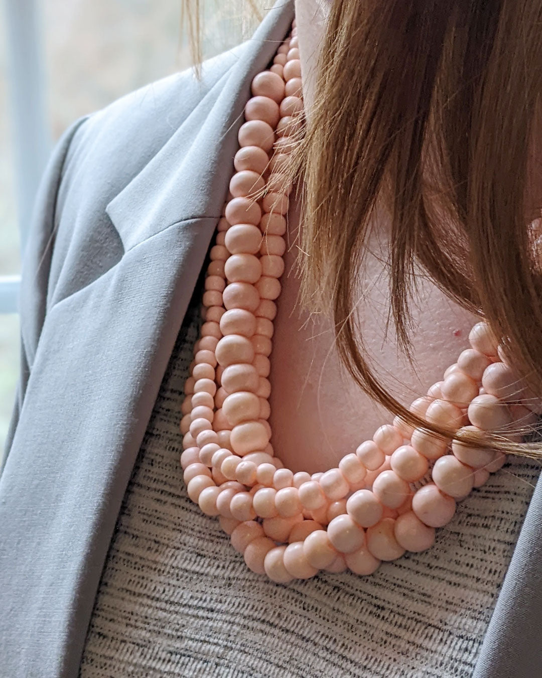 Handmade five-strand necklace with alternating bead sizes