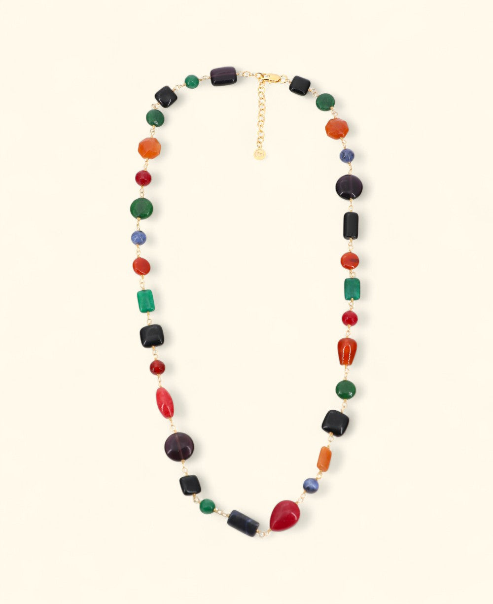 Eclectic multicolor stone necklace laid in soft curve