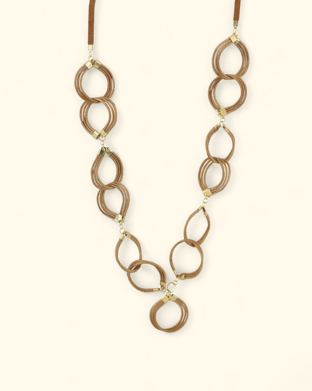 Brazilian golden grass necklace with petal-shaped interlocking loops