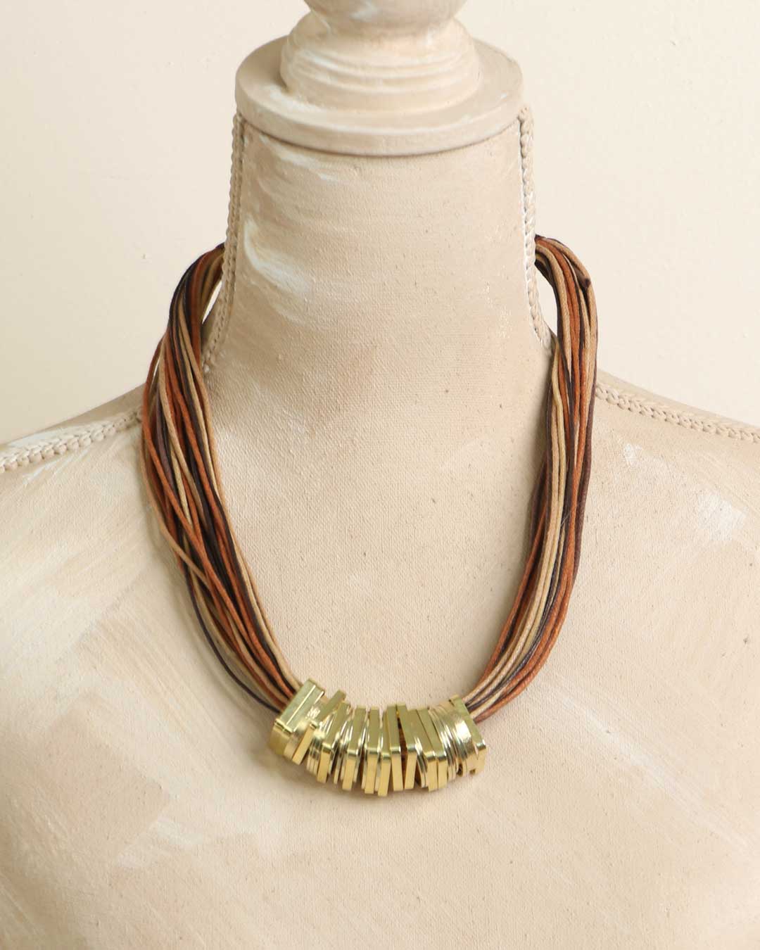 Multi-strand necklace with organic textures and metallic shine