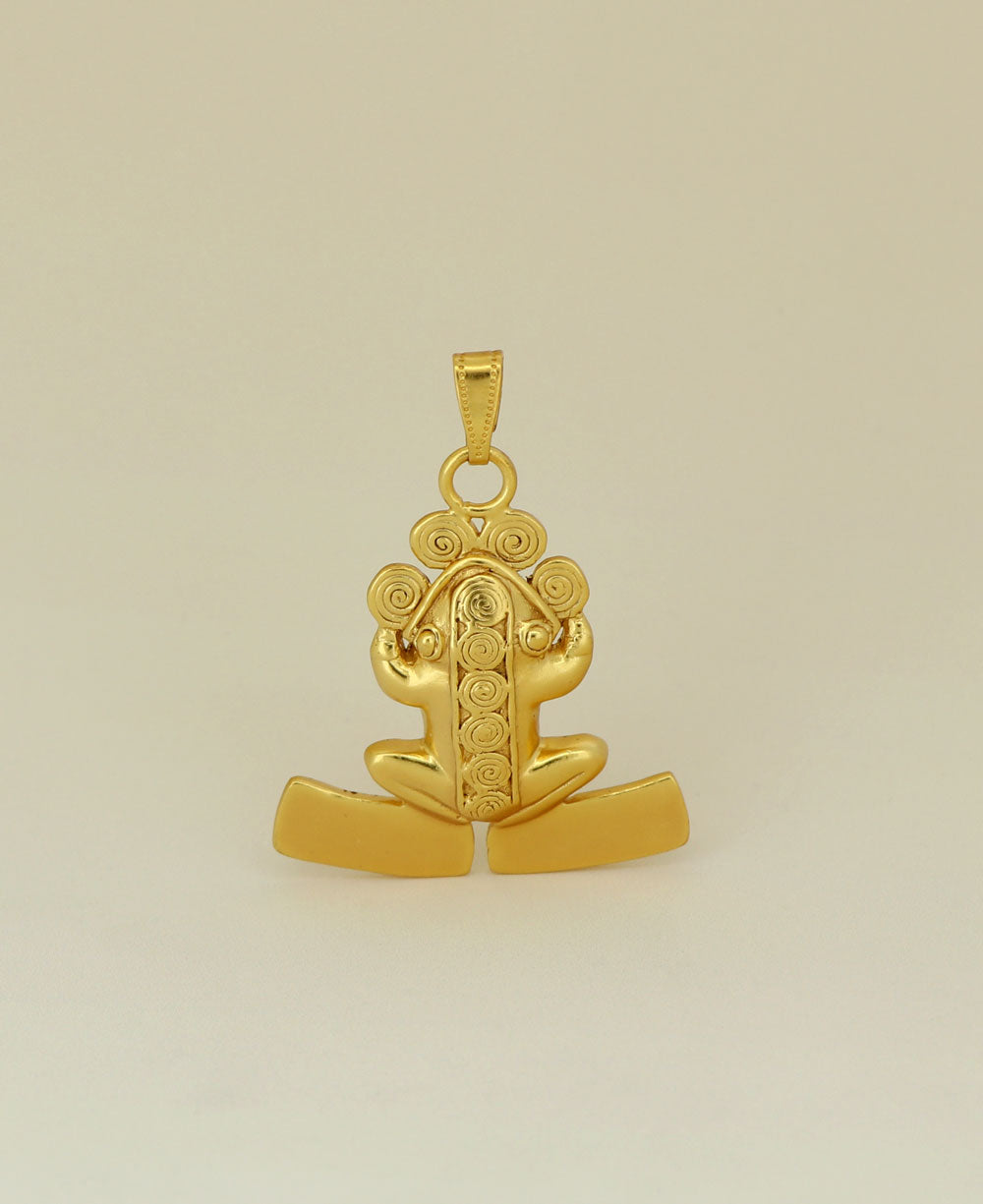 Close-up view of the beautifully crafted gold frog pendant, displaying detailed workmanship.