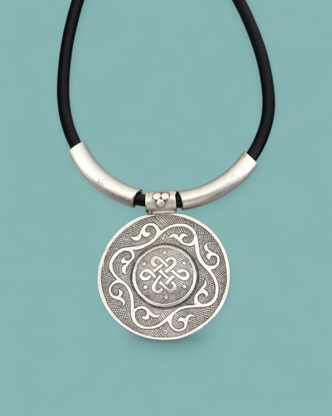 Eternal knot statement necklace on black cord