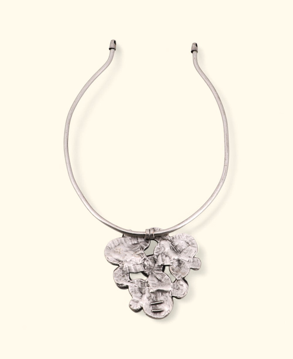 Silver-tone statement necklace with geometric pendant