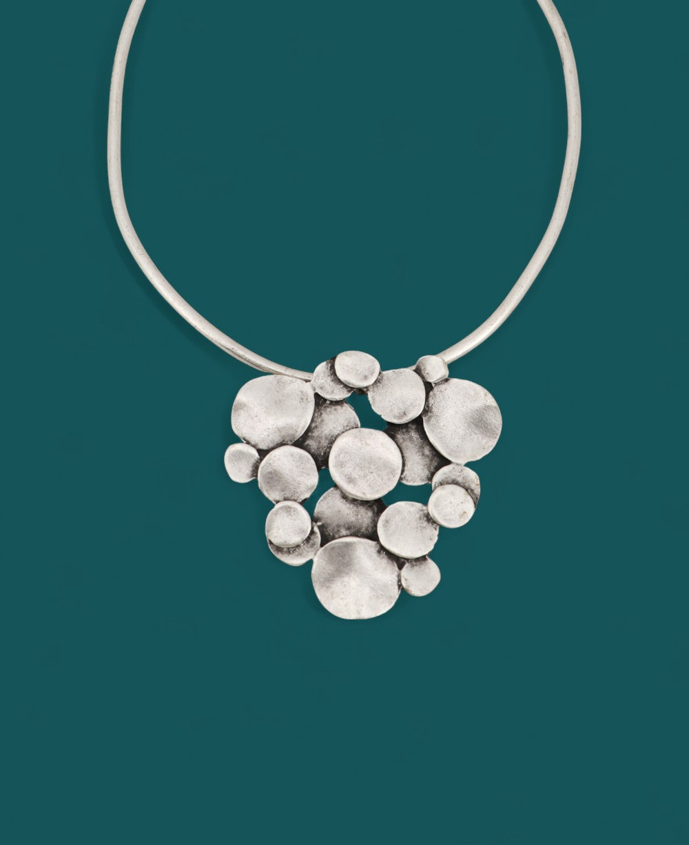 Sculptural pewter collar necklace with clustered discs