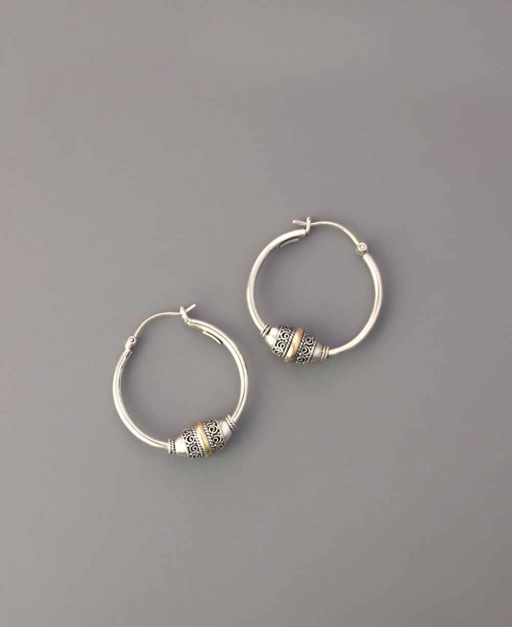 Sterling silver hoop earrings with filigree design