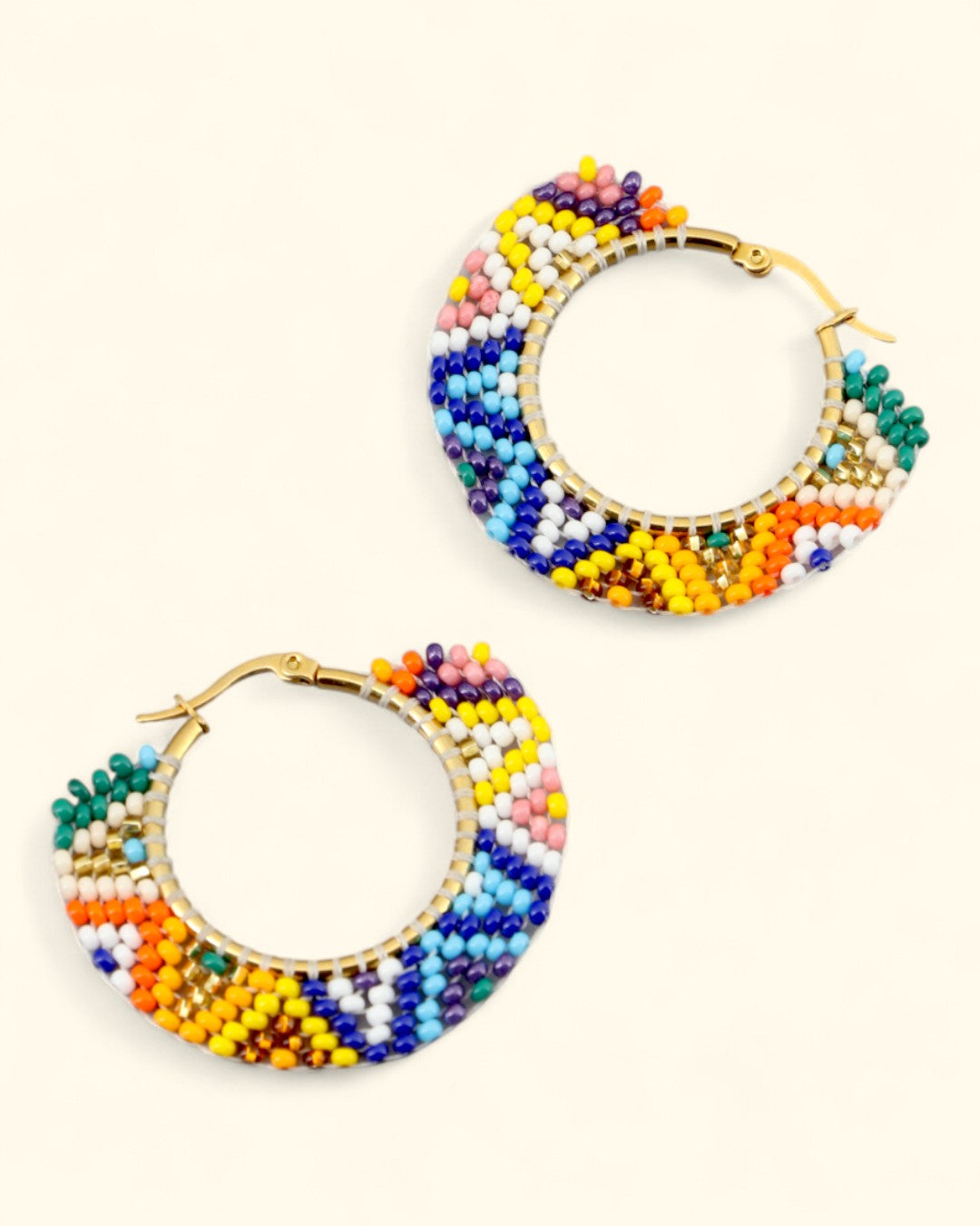 Colorful hoop earrings with handwoven Guatemalan beads