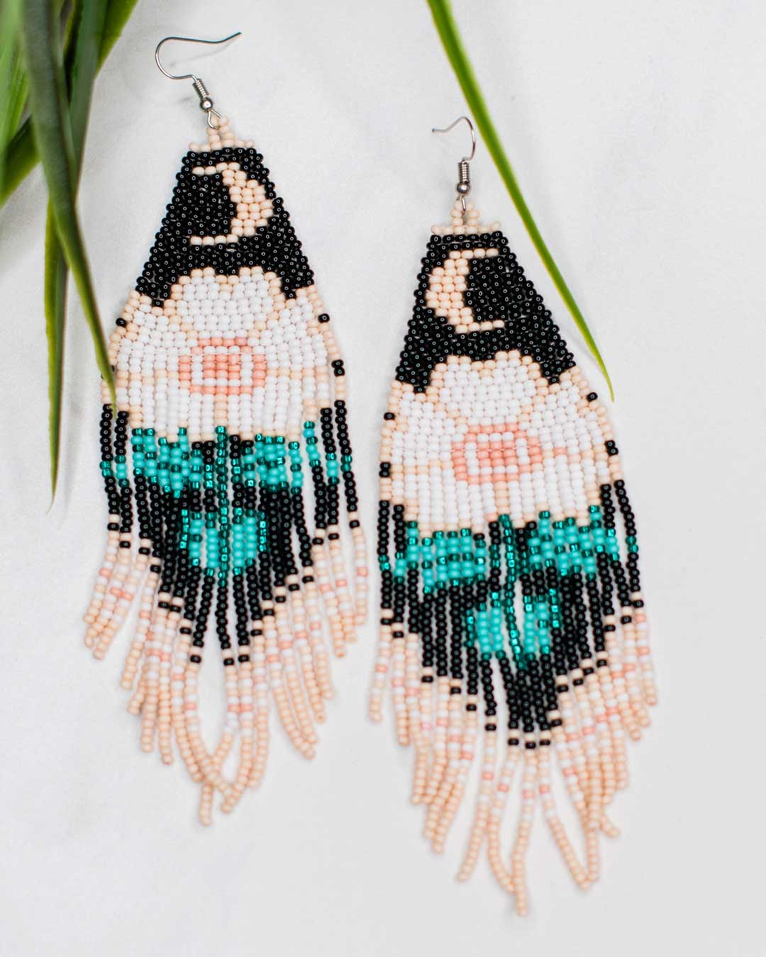 Statement fringe earrings with moon and floral bead design