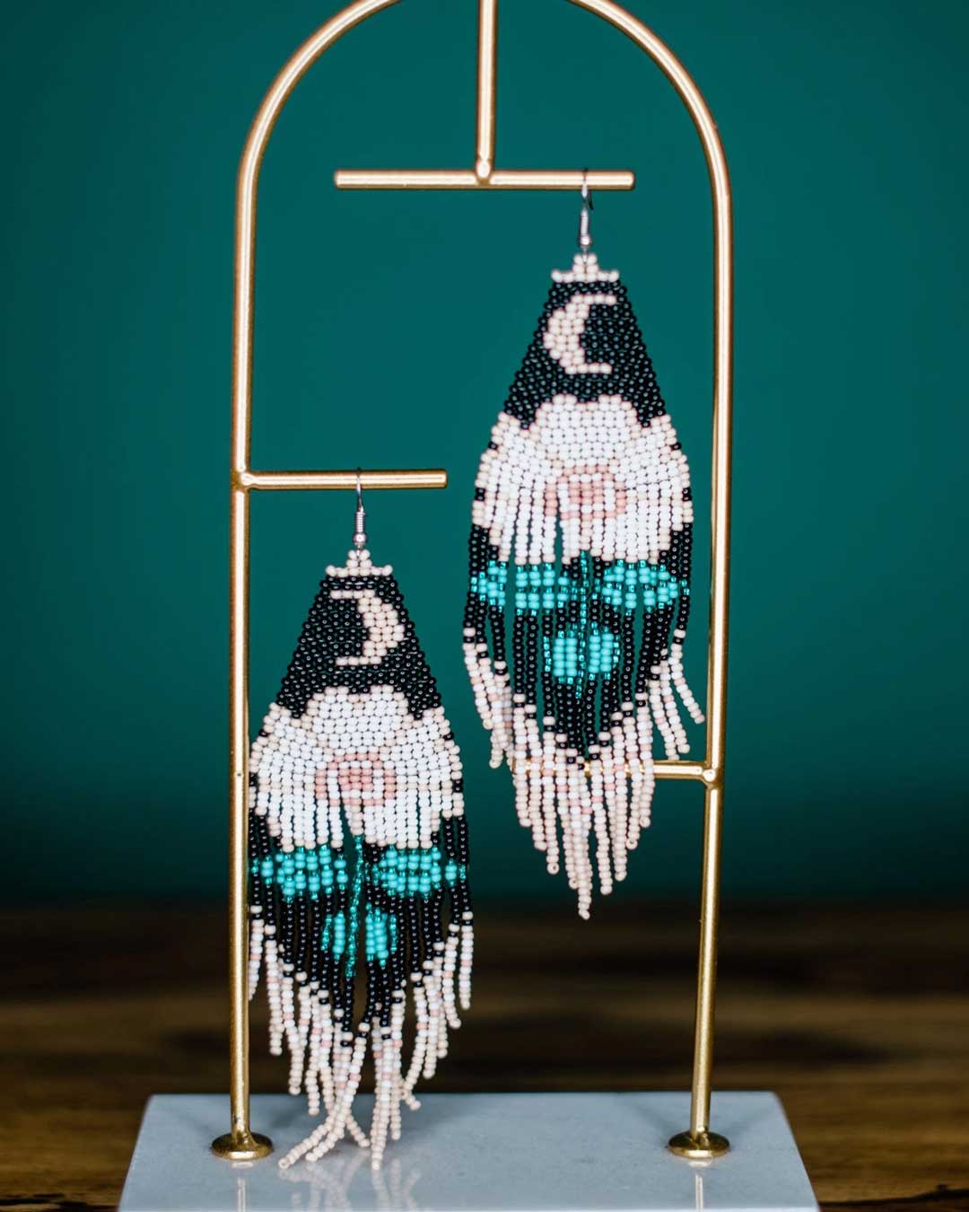 Hand-beaded moonflower earrings in black and turquoise on gold stand