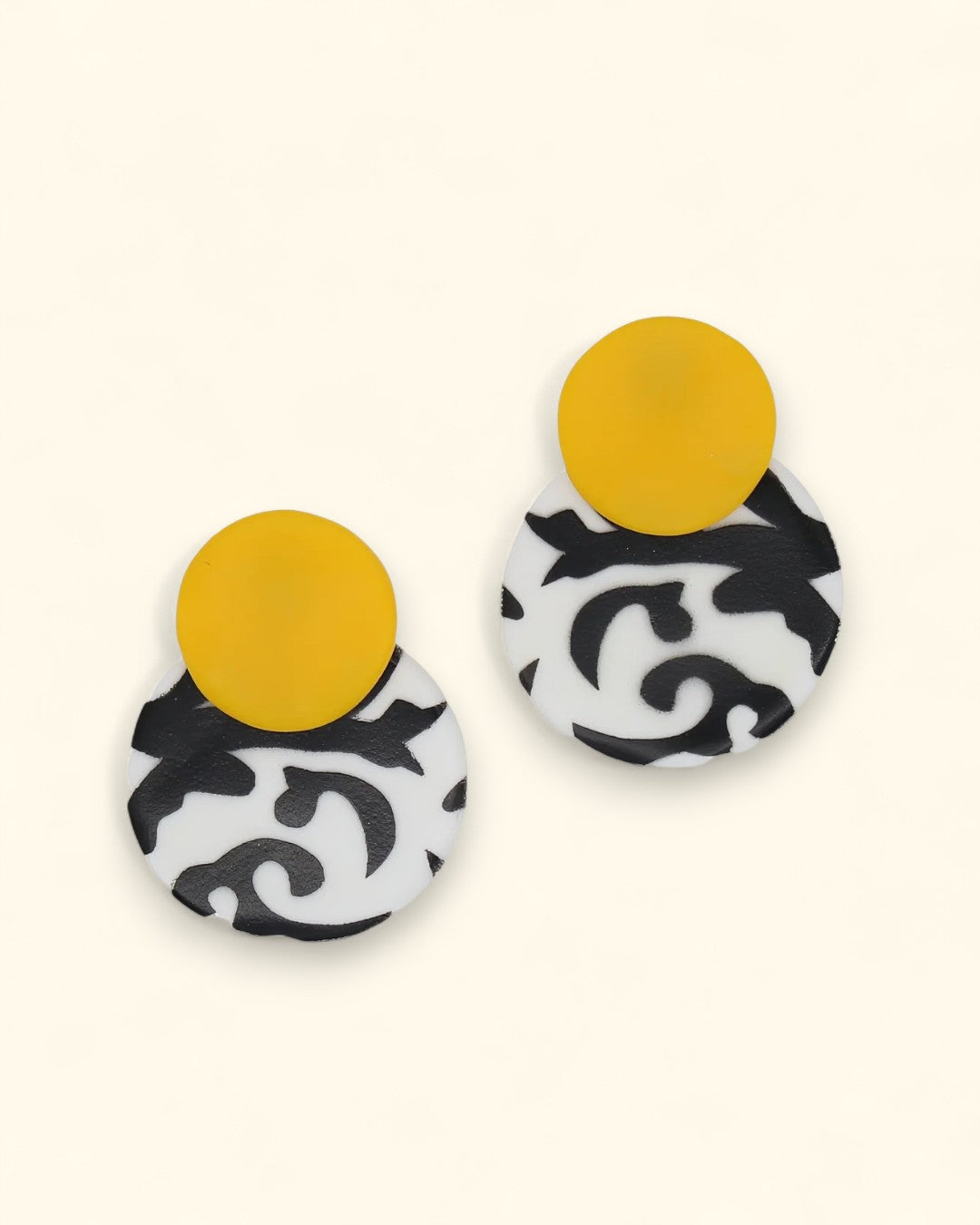 Lightweight drop earrings in graphic black-and-white with yellow accents