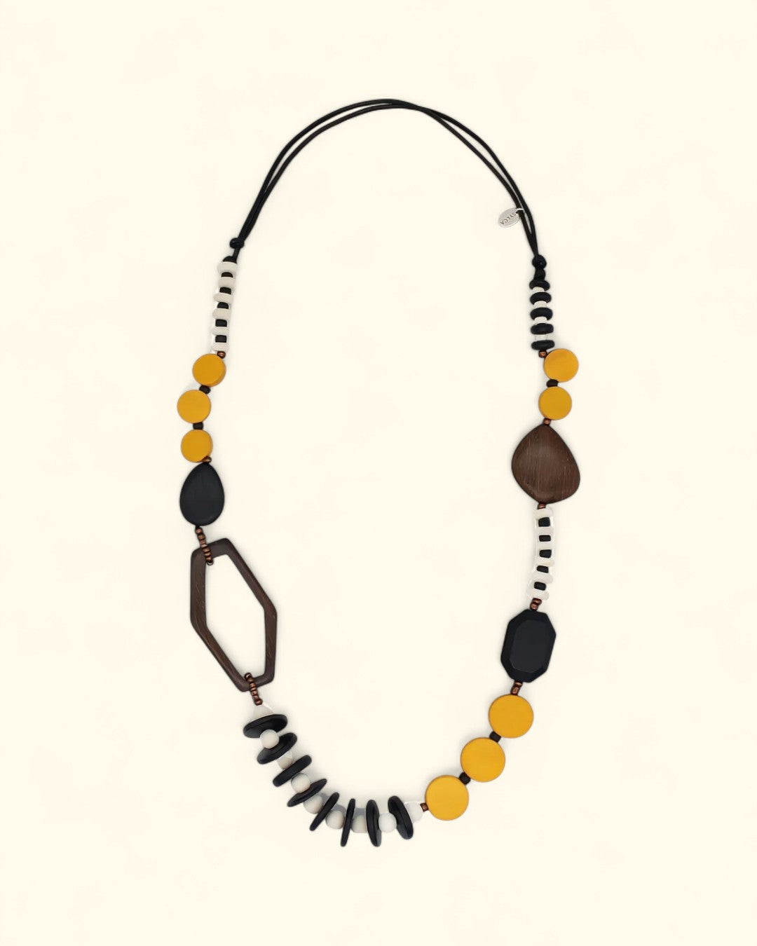 Artisan necklace with bold yellow, black, and brown wood beads