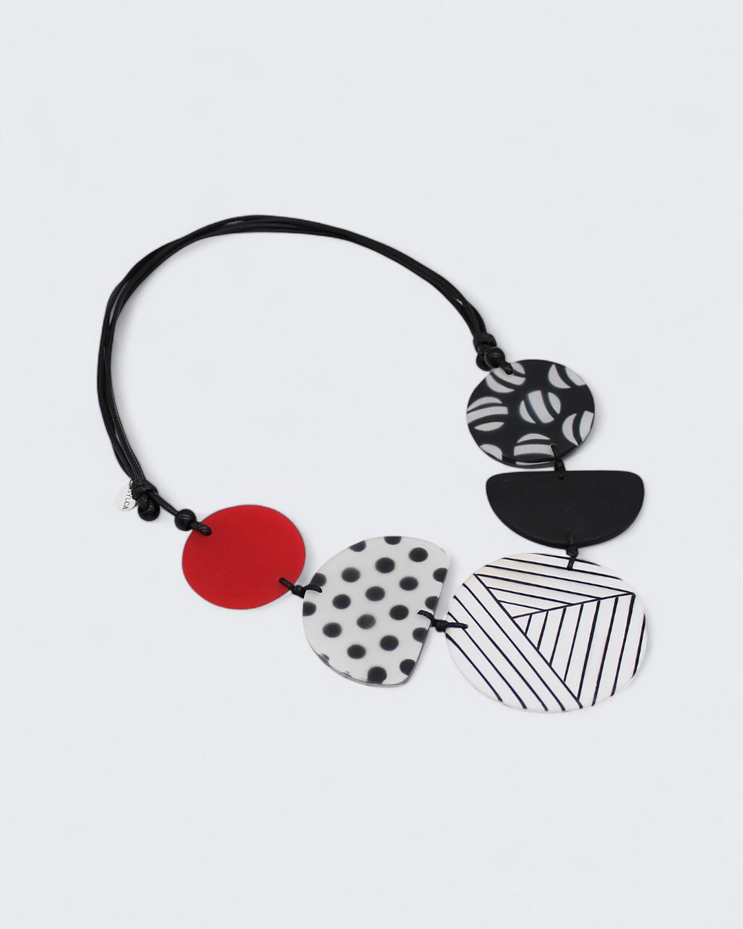 Modern resin necklace with black cord and adjustable length