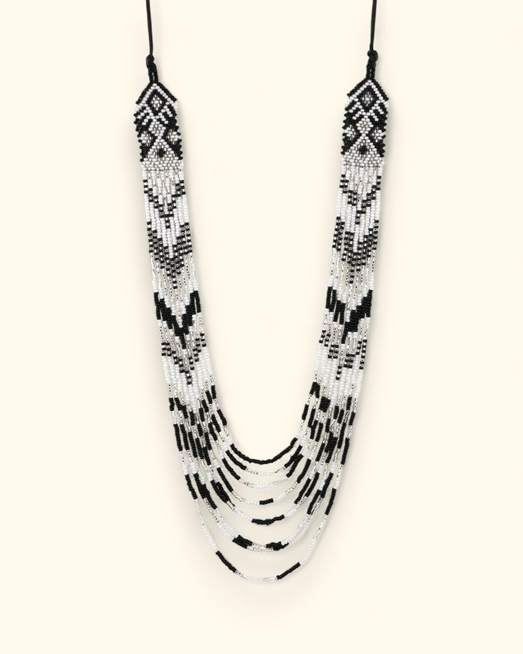 Black and white layered beaded necklace with geometric detail