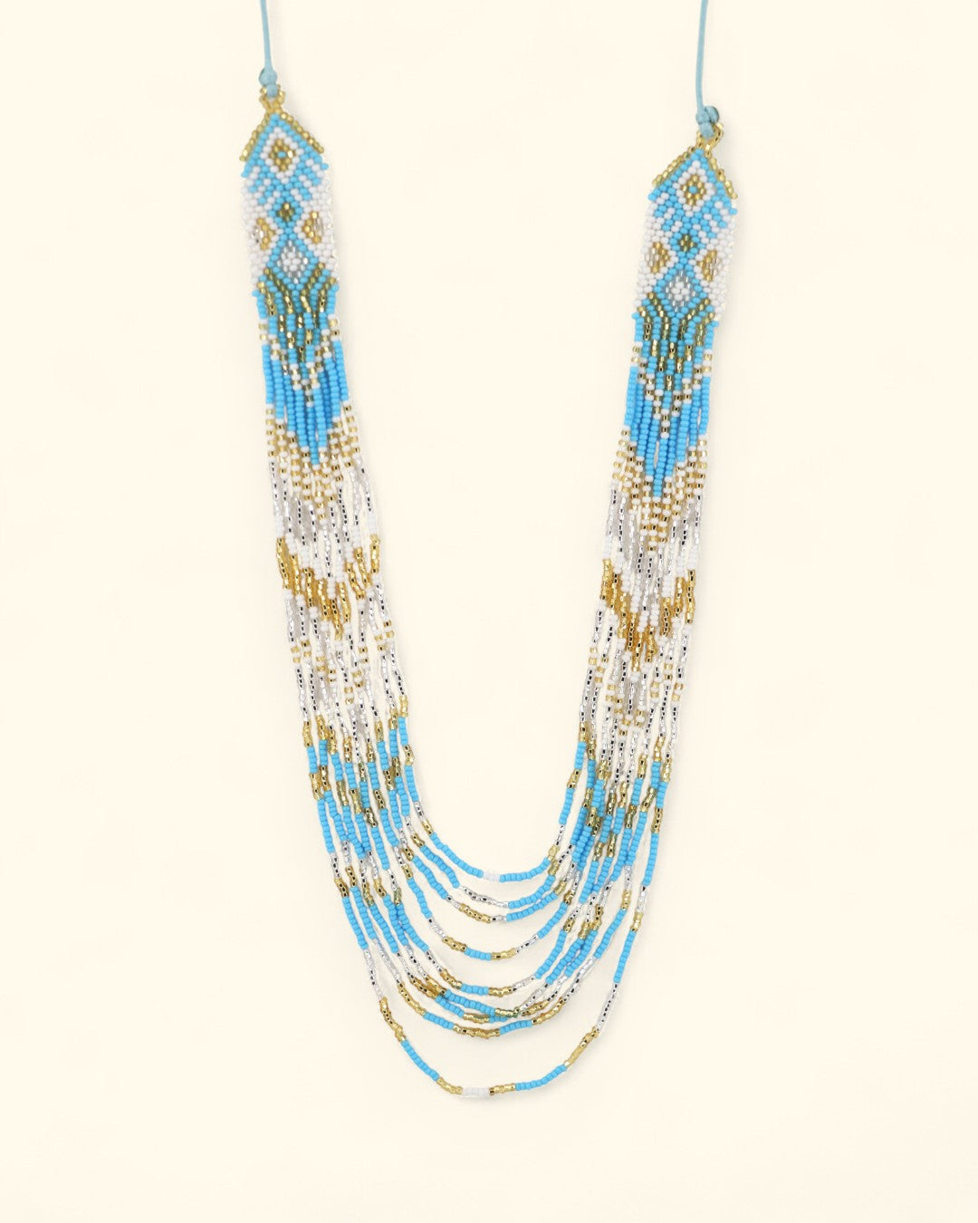 Layered beaded necklace in blue, white, and gold