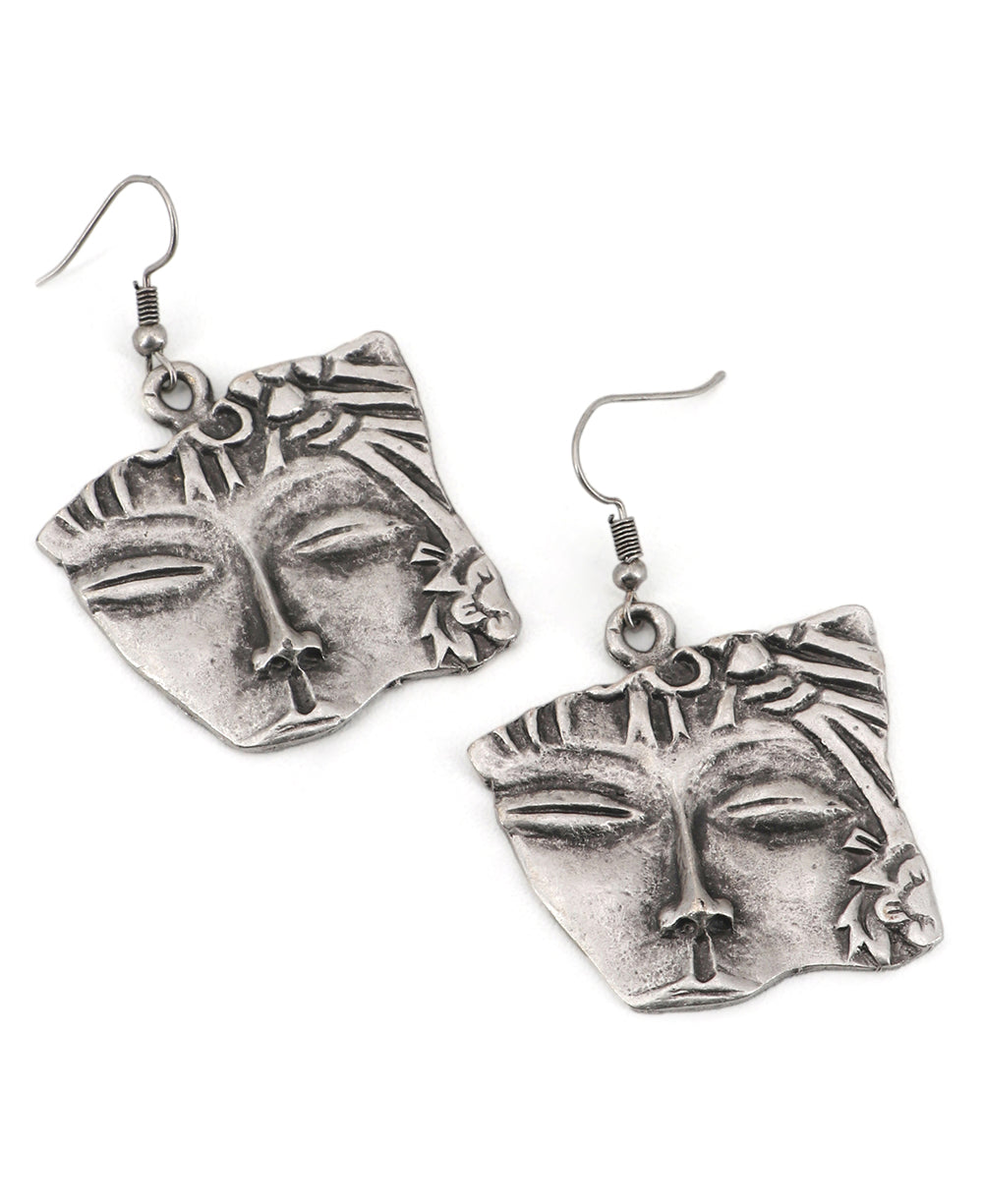 Artistic face statement earrings