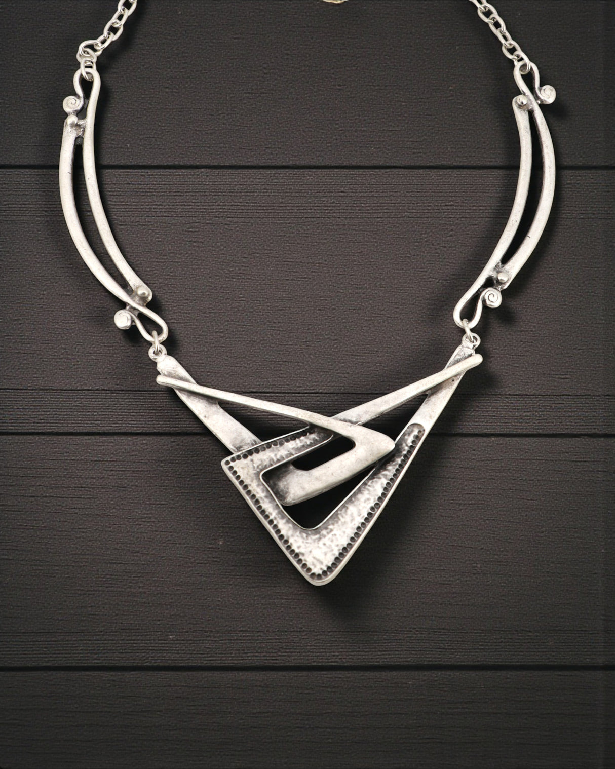 Textured alloy necklace with modern abstract design