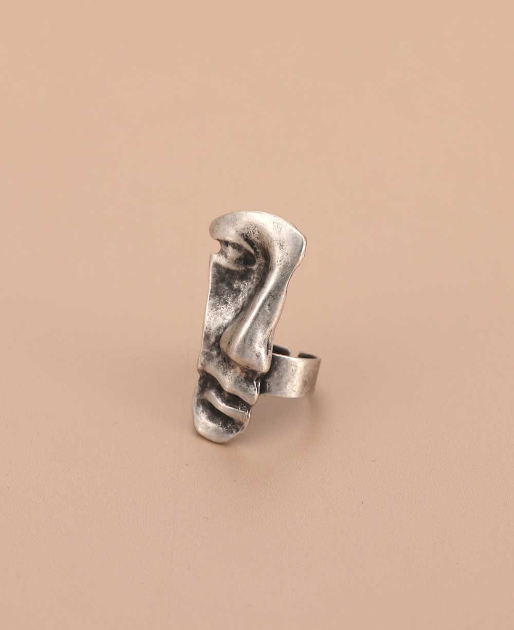 Adjustable artistic face ring