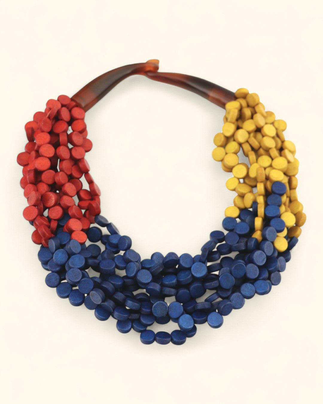 Tri-color wood disc necklace in red, yellow, and blue