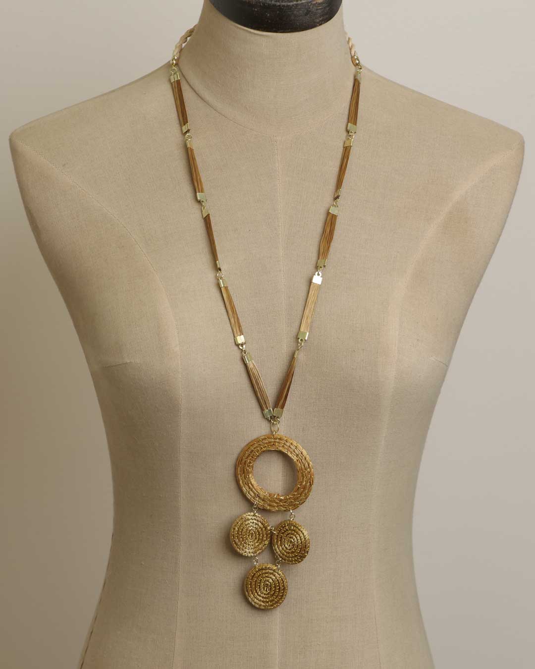 Golden Heritage: Handwoven Brazilian Grass Necklace