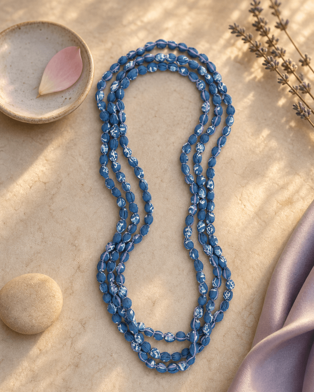 Blue Tones Endless Fabric-Wrapped Beaded Necklace — necklaces, vibey closeup lifestyle photo