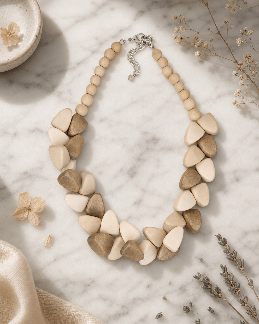 Chunky Wooden Bead Necklace with Triangular Accents — necklaces, editorial marble lifestyle photo