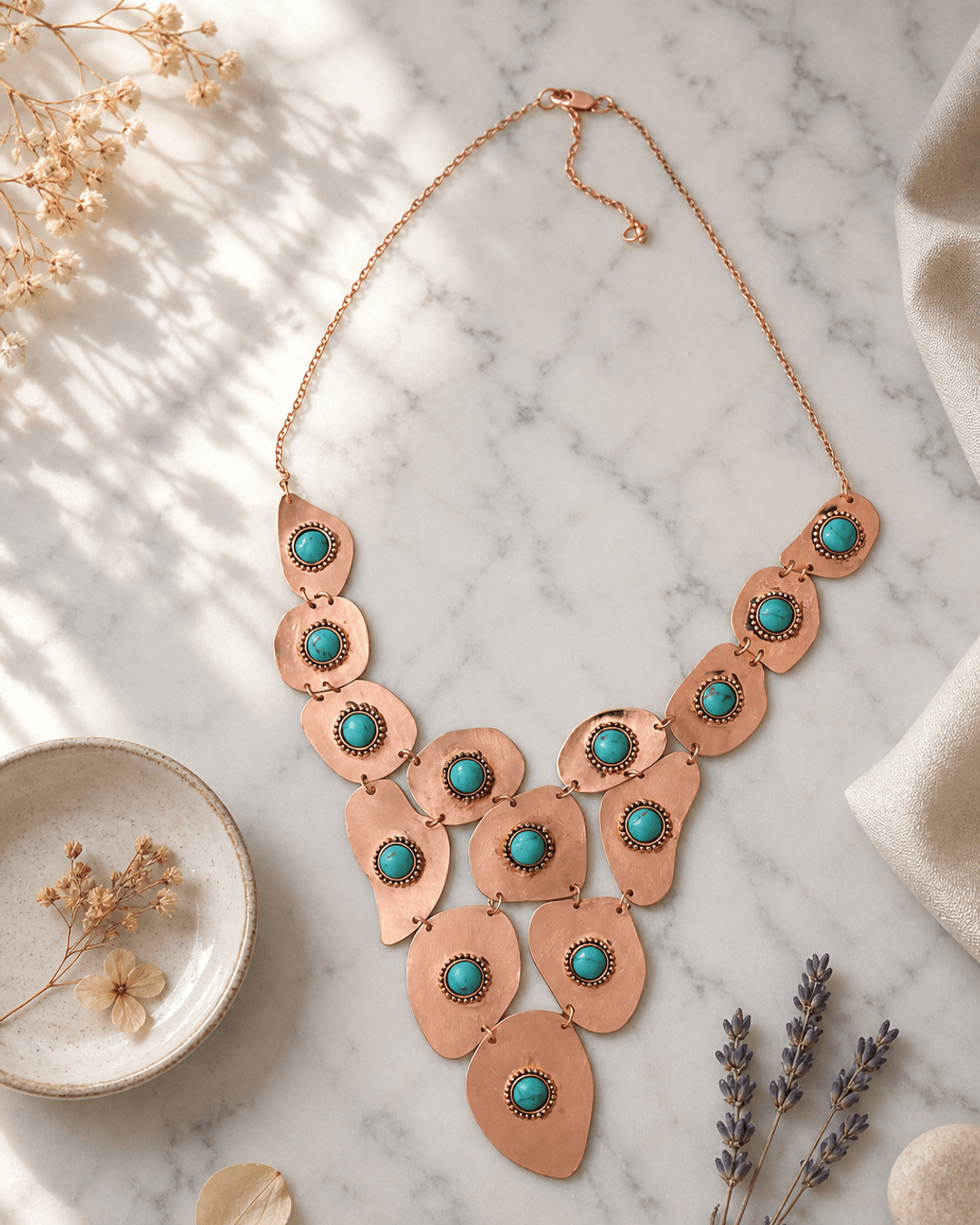 Gold-Tone Copper Necklace with Turquoise Polymer Clay Beads — necklaces, editorial marble lifestyle photo