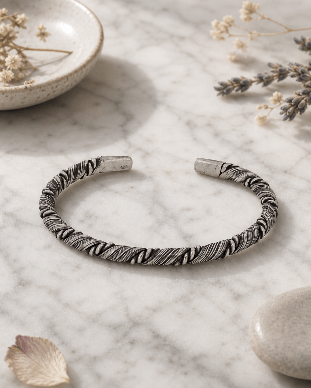 Hilltribe Sterling Silver Etched Rope-Wrapped Adjustable Cuff Bracelet — bracelets, editorial marble lifestyle photo