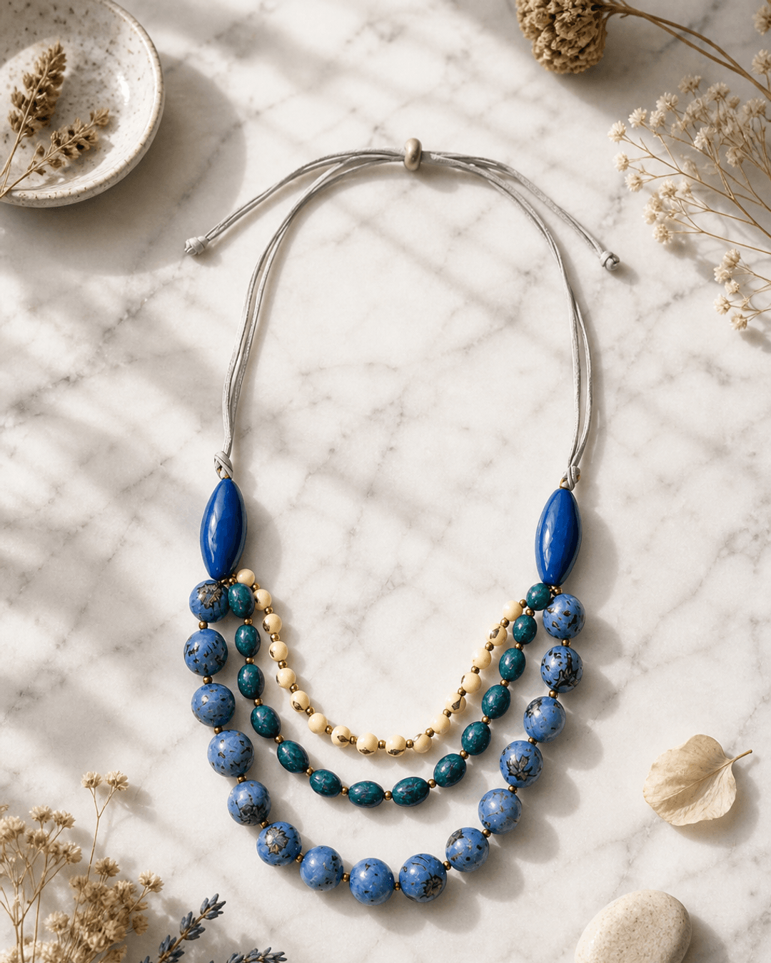 Idra Multi-Strand Natural Bead Necklace – Ecuador — necklaces, editorial marble lifestyle photo