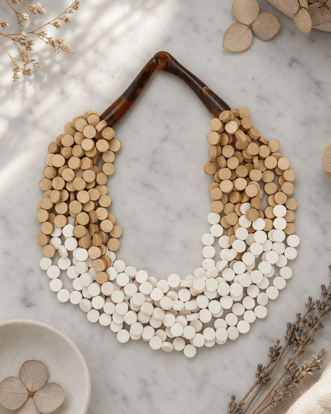 Multi-Strand White and Beige Necklace — necklaces, editorial marble lifestyle photo