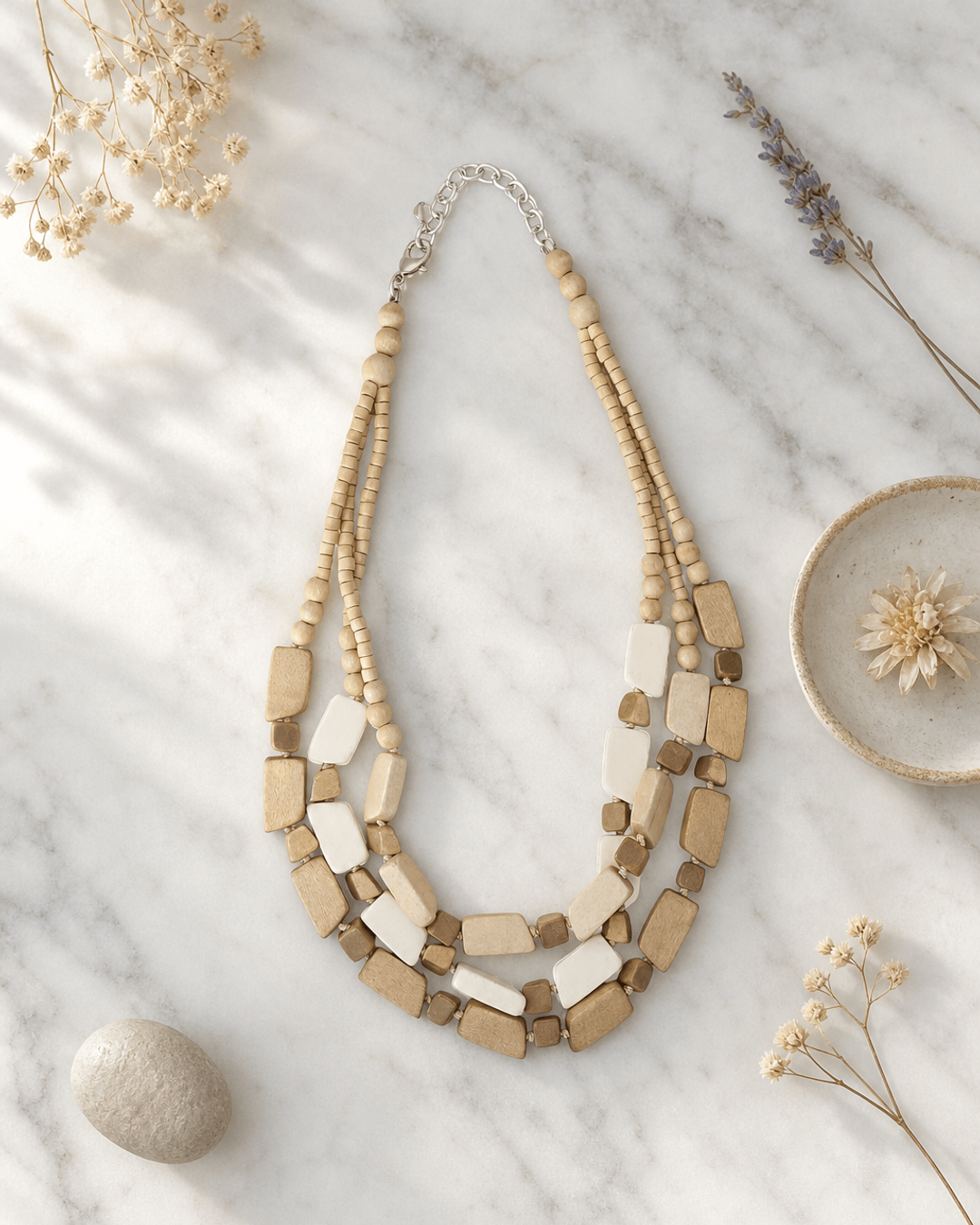 Multi-Strand Wooden Bead Necklace — necklaces, editorial marble lifestyle photo