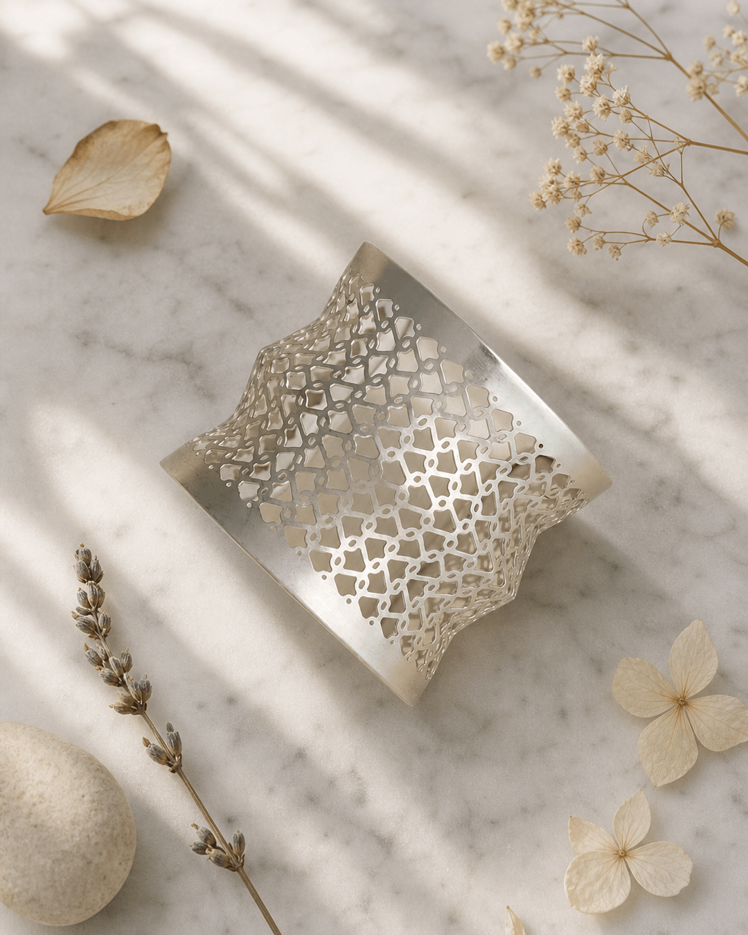 Silver-Tone Geometric Lattice Wide Cuff Bracelet — bracelets, editorial marble lifestyle photo