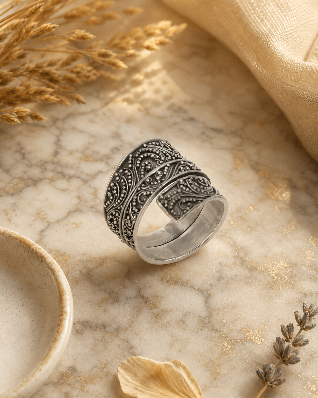 Sterling Silver Wide Band Filigree Ring — rings, editorial marble warm lifestyle photo