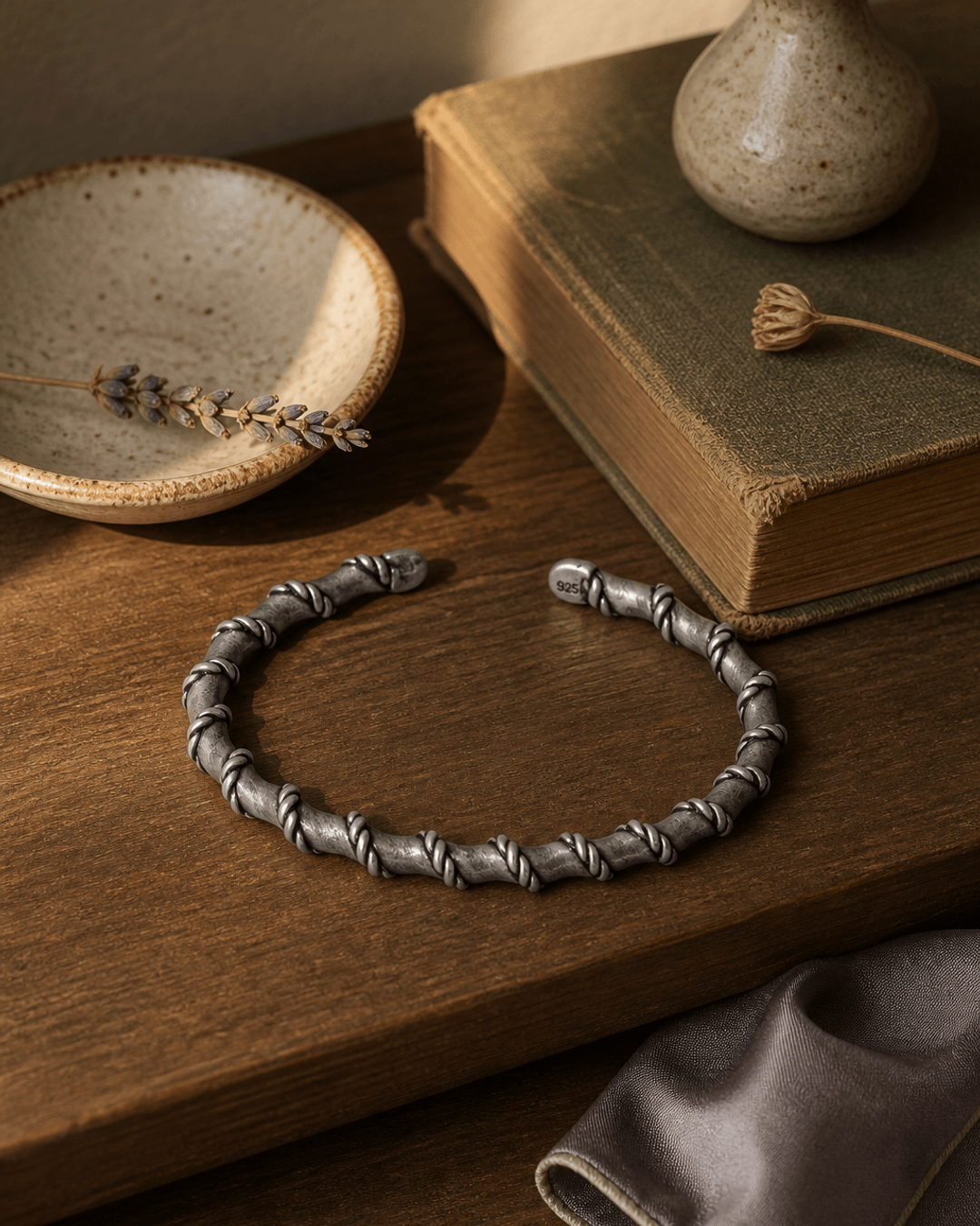 Hilltribe Sterling Silver Rope-Wrapped Adjustable Cuff Bracelet — bracelets, sunlit shelf lifestyle photo