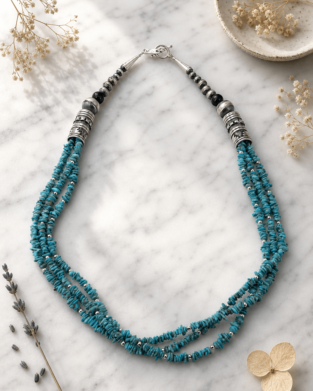 Triple-Strand Genuine Turquoise Chips and Sterling Silver Bead Necklace - Southwest-Inspired, Handcrafted in USA — necklaces, editorial marble lifestyle photo