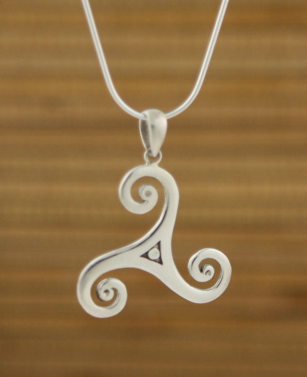 Sterling Silver Triskelion Celtic Pendant. Available at https://www.culturalelements.com/products/sterling-silver-celtic-triskele-pendant