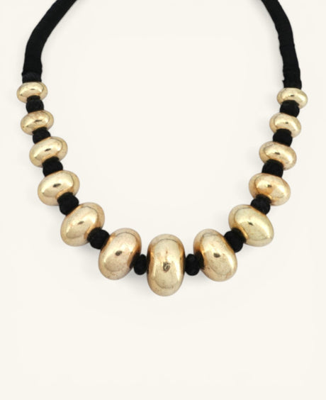 hampagne gold chunky bead choker necklace on black cord