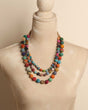 Handmade recycled fabric necklace with layered design